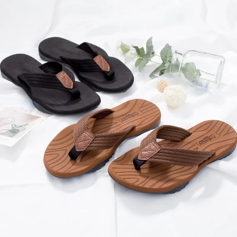 Q182 new summer Southeast Asia leisure trend men's rubber thick-soled pinch herringbone beach slippers denim spot